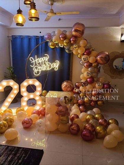 This angle highlights the butterfly details and the mix of balloon textures, from matte to metallic, which adds visual interest.