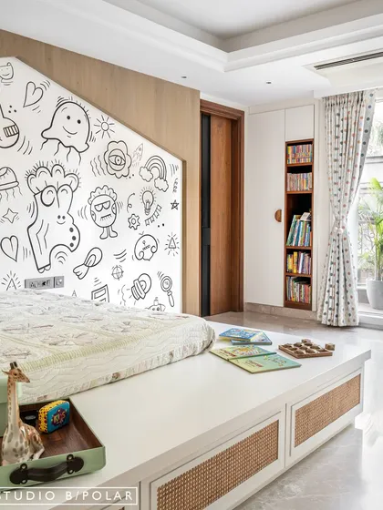 The room is designed to be bright and airy, with a dedicated reading nook and plenty of floor space for play. The design is minimal yet full of character and charm.