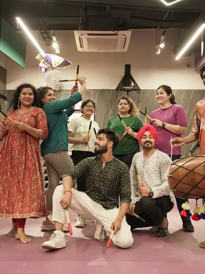 Fitness and festivities go hand in hand here. This is our community celebrating Navratri with a Dandiya night, complete with dhol beats and colorful sticks. It's a perfect example of how we build a fun, supportive fitness family.