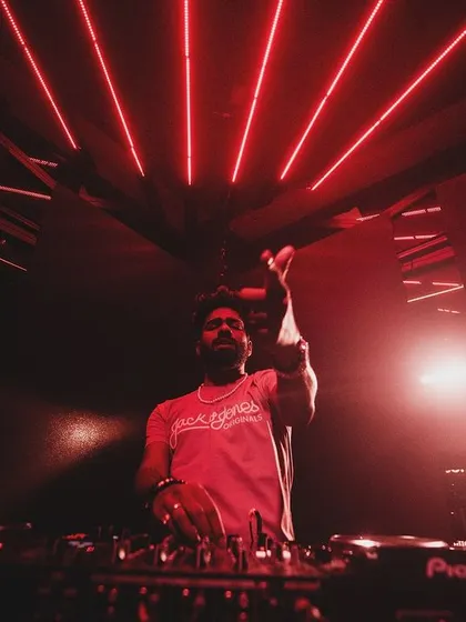 A red-lit shot of me at the console.