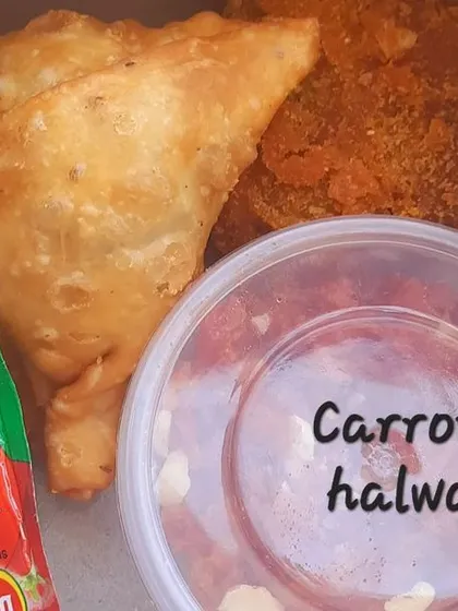 For those who love classic Indian flavors, I create snack boxes like this one for adults, featuring my crispy samosas, veg cutlets, and rich, homemade carrot halwa. It's a complete, satisfying treat.