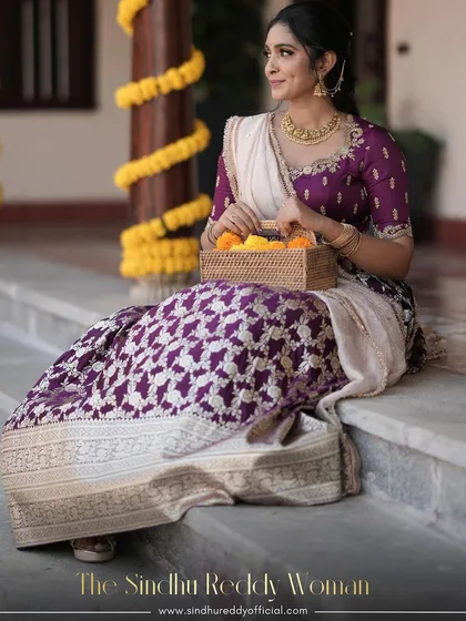 "The Sindhu Reddy Woman" - our client looks stunning in her purple and cream lehenga.