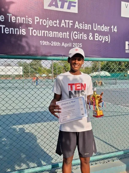Holding the trophy and certificates of merit at the ATF Asian Under 14 tournament. We prepare our players to handle the demands of competing in both singles and doubles draws.