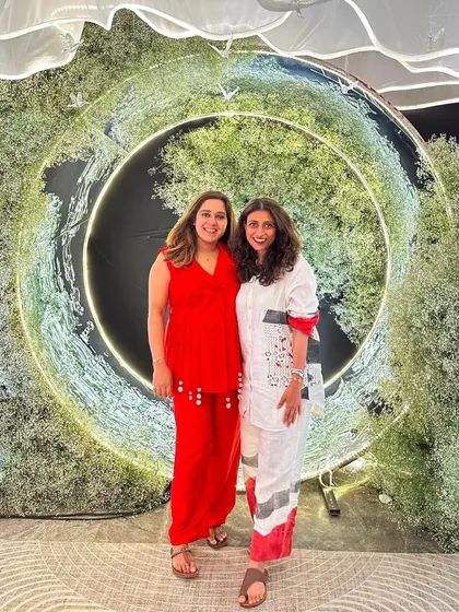 Standing in front of one of our creations. The Doli Diary isn't just the company we built; it's the life we built, together. We are so proud of our team and the incredible celebrations we get to be a part of.