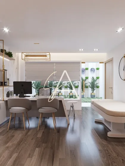 A doctor's cabin needs to be both a functional workspace and a tranquil consultation area. Here, we balanced a professional setup with direct visual access to an outdoor green wall, ensuring natural light and a sense of openness for both the doctor and the patient.