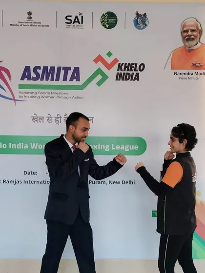 A lighthearted moment, squaring off with a junior champion. It's all about passion for the sport.