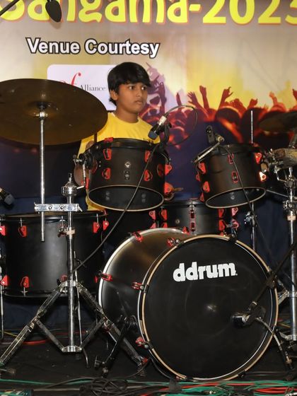 Manish at his ddrum kit, performing at Kalaa Sangama 2023.