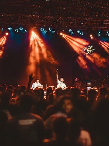 The view from the DJ booth at IIM Bangalore. The stage lights and the massive crowd create an unforgettable atmosphere.