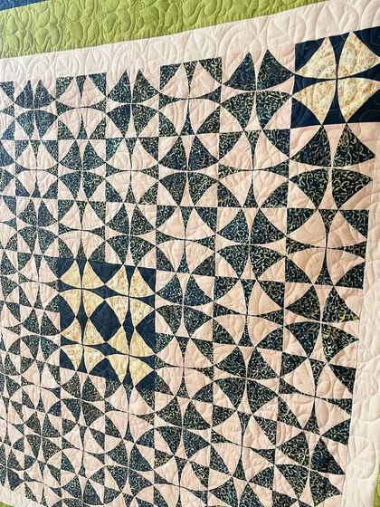 A close-up of the intricate piecing in the Wheel of Mystery quilt.