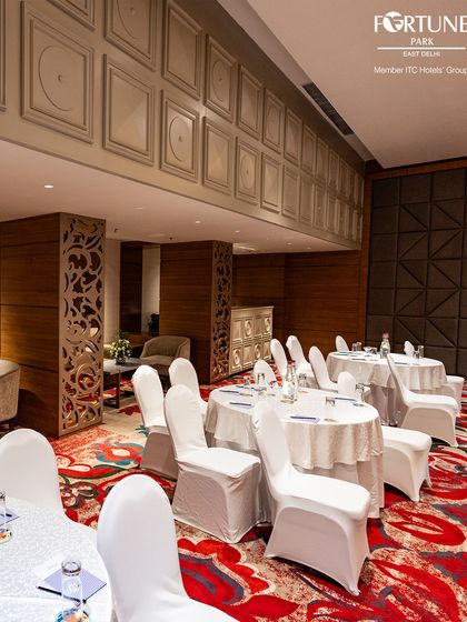 This image captures the pre-event calm in my banquet hall, arranged for a corporate workshop. The partial view of the lounge area shows the additional breakout space available for networking and informal discussions.