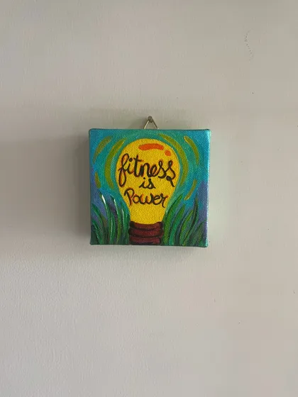 An idea captured in a lightbulb. This "Fitness is Power" mini canvas was part of a custom order, blending art with a personal passion.