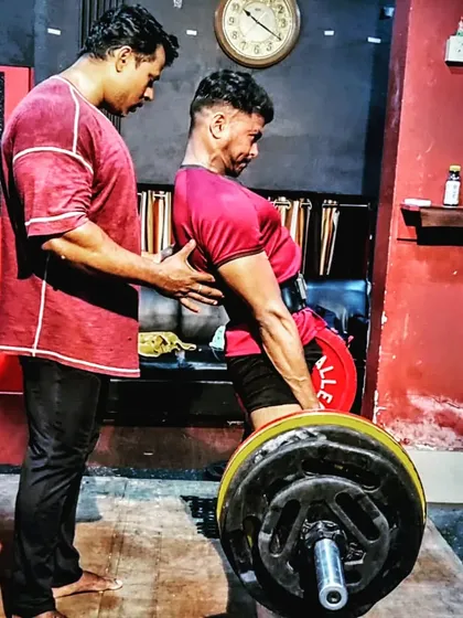 Deadlift is the ultimate test of strength. I focus on every detail of the form, from the setup to the lockout. This hands-on correction is what prevents injury and builds real power.