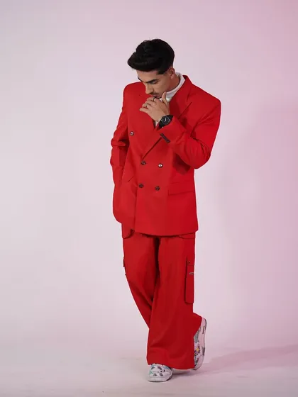 Sometimes you just need a power suit. This bold red number isn't for blending in. It's for making a statement at any formal event or party.