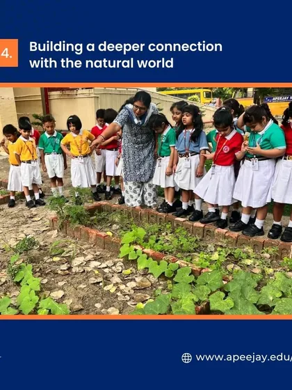 Our nature walk helped students build a deeper connection with the natural world. A teacher guides them as they observe different plants, fostering a sense of wonder and respect for the environment.