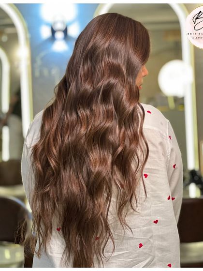 Another angle of the luminous brown hair, capturing the rich tones and glossy texture that make it so glamorous.