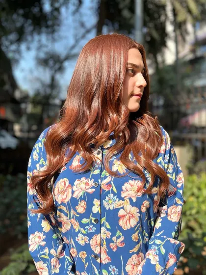 Indulge in the allure of a Copper Brown Melt. This global hair color is a beautiful blend of warmth and sophistication.