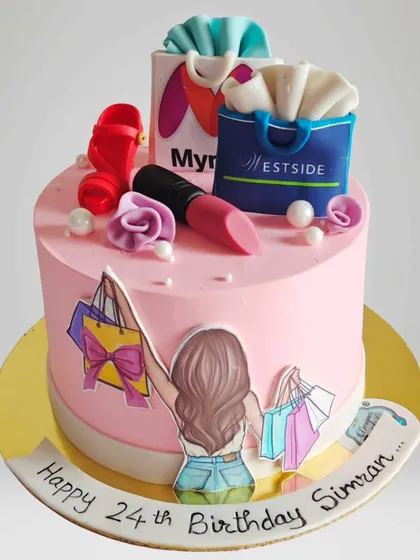 A shopping-themed cake for a 24th birthday. It's decorated with edible shopping bags from Myntra and Westside, along with makeup items for the ultimate shopaholic.