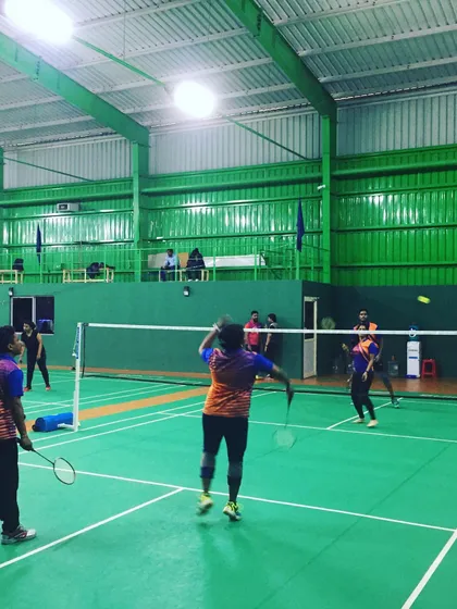 A moment of intense, friendly competition during a corporate badminton league I hosted. Events like these are a fantastic way to encourage team building and boost morale outside the office environment.