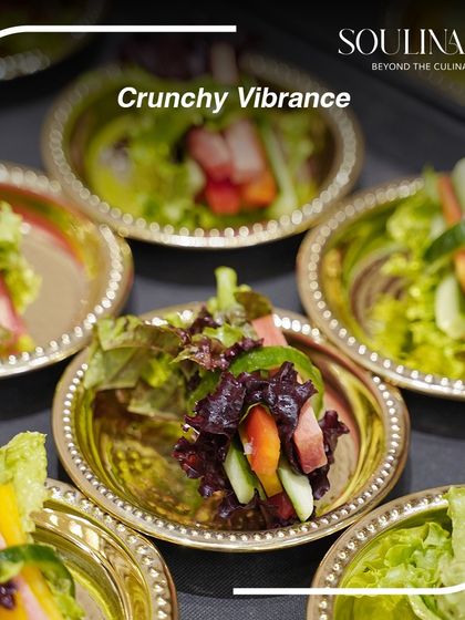 Crunchy and vibrant lettuce wraps, filled with fresh vegetables and served in elegant golden bowls. A healthy and refreshing appetizer option.