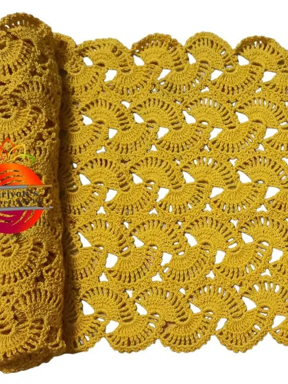 The lacy stole in a warm mustard yellow. This color is perfect for adding a pop of brightness to your outfit.