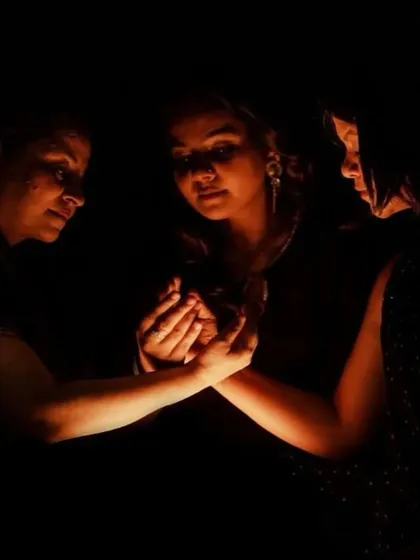 An intimate and powerful image from the 'Quest' photoshoot. This moment represents the support and shared strength among the characters in their journey of resilience.
