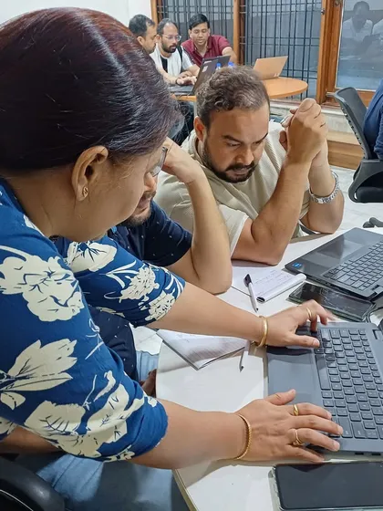 Collaborative Learning in a Corporate Setting. Participants working together during our Advanced Excel training. My workshops encourage peer-to-peer learning, as colleagues help each other understand and apply new technical skills.
