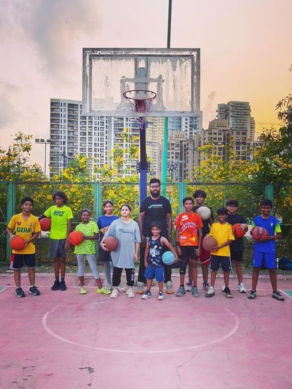 Gameday Saturday! A group of our young players with their coach, ready to compete and have fun on the court.
