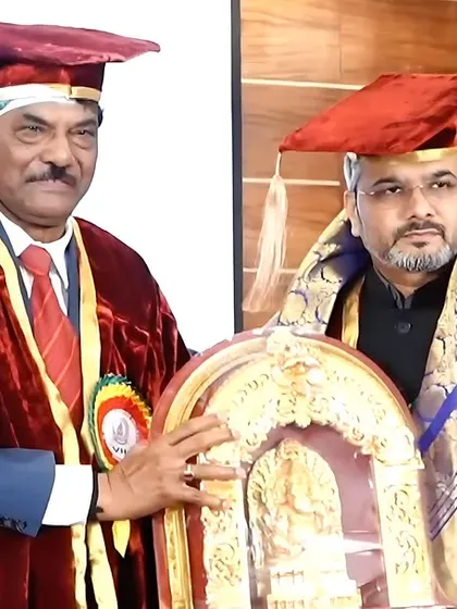 Being formally felicitated with a shawl and a memento by the college chairman. I am humbled by this gesture of respect.