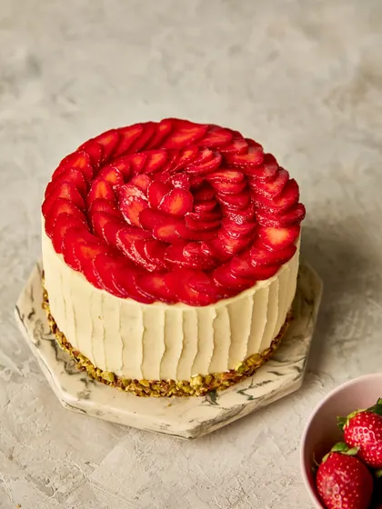 Our Pistachio & Strawberry Cream Cake is a seasonal favourite. The nutty pistachio cake pairs beautifully with the fresh strawberries and light cream.