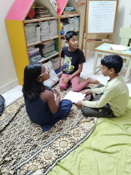 I believe confidence grows in a supportive circle. Our public speaking workshops are a safe space for children to practice expressing their ideas, collaborate on stories, and find their voice among friends. It's amazing to watch shy kids blossom into confident speakers.