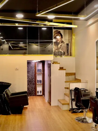 A glimpse into my modern, two-level salon space. I've created a chic and professional environment with high-end equipment, including comfortable hair wash stations, so you feel pampered from the moment you walk in.