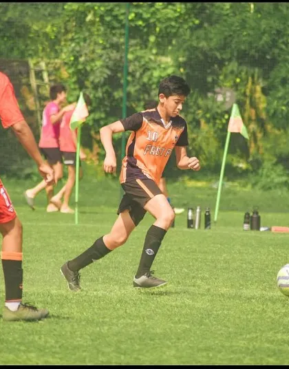 Our player on the attack, running at defenders during the Pride Cup.
