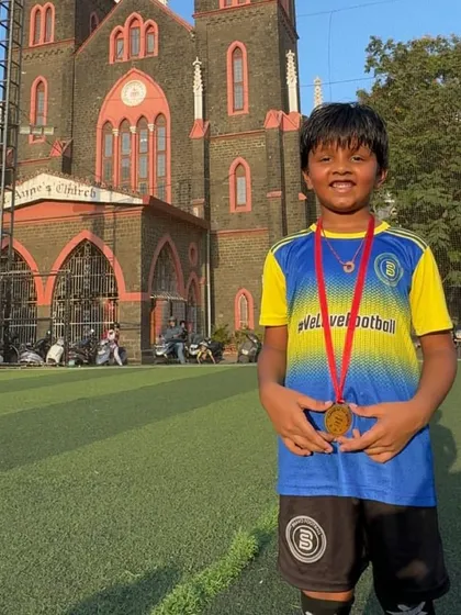 This young player earned his Player of the Month medal through hard work and a great attitude.