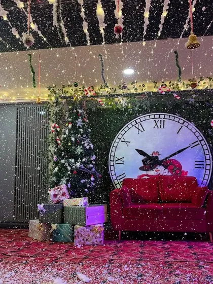 Another view of the snowy Christmas setup, perfect for guests to take holiday photos.