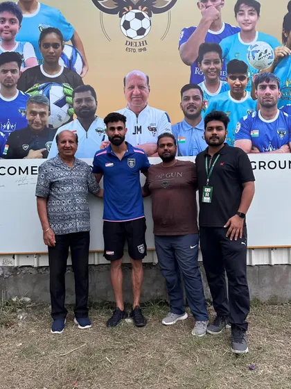 Our management and coaches with an Odisha FC player. It's a great opportunity for our staff to interact with professionals.