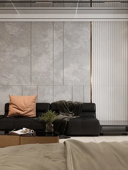This bedroom features a concrete-finish wall panel and a glass-encased walk-in wardrobe section. We handle the execution of such specialized elements, ensuring both the aesthetic and the structural integrity are met.
