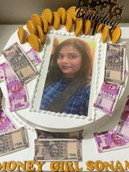 A fun and personalized money-themed photo cake. I can add any edible photo to your cake and customize it with creative elements like these edible currency notes, making it a truly unique gift for a birthday celebration.