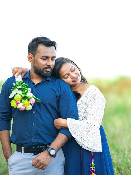 A moment of quiet rest and affection, with a bouquet of flowers adding a touch of color and romance to the scene.