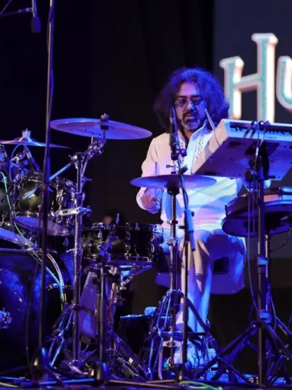 Our drummer at his kit, providing the foundation for a great night of music for a good cause.