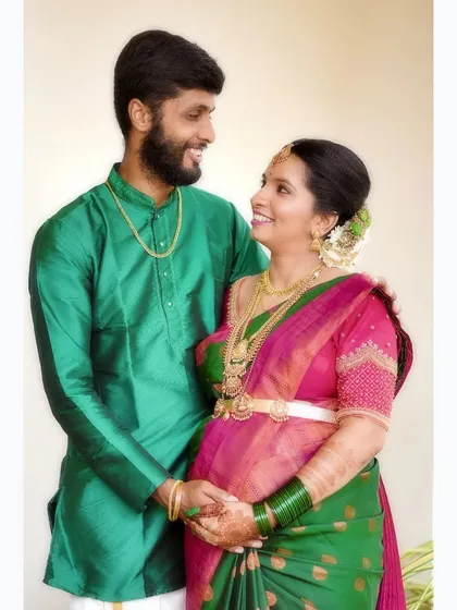 A classic portrait of an expecting couple during their traditional South Indian baby shower. We focus on capturing the joy and connection between the couple, highlighting their beautiful attire and the significance of the day.