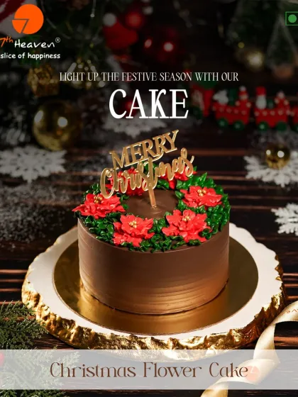 Light up the festive season with our Christmas Flower Cake. This rich chocolate cake is topped with a beautiful poinsettia design made from frosting and a "Merry Christmas" topper.