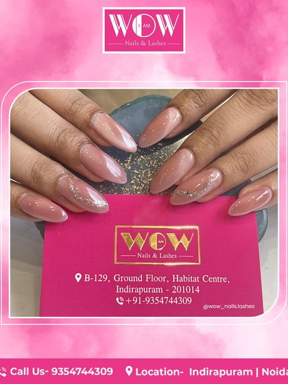 Elegant almond-shaped extensions in a dusty rose color. A subtle touch of silver glitter on the accent nail adds just the right amount of sparkle to this sophisticated look.