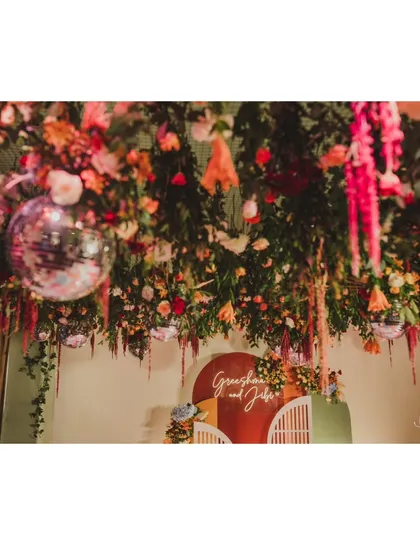 Another angle of the floral ceiling, highlighting the depth and artistry of the arrangement.