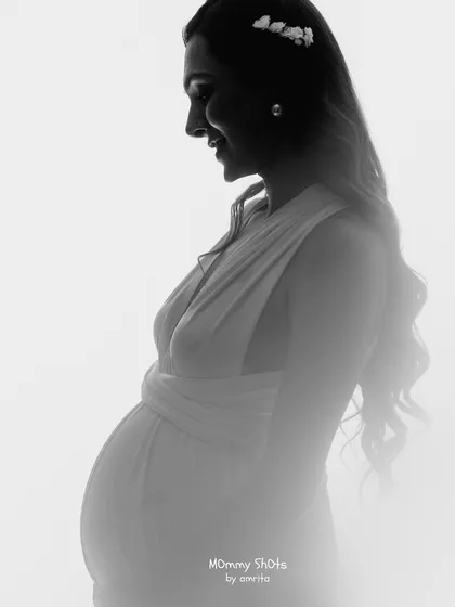 A soft and dreamy high-key silhouette in black and white.