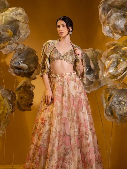 This extensive collection features a wide array of modern festive attire. From vibrant sharara sets and elegant anarkalis to chic jumpsuits and light lehengas, these pieces are curated for wedding guests and anyone looking for a stylish outfit for a special occasion.