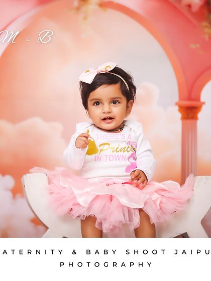 "There's a princess in town!" This sitter session portrait uses a beautiful pink palace backdrop and a cute tutu to make your baby girl feel like royalty.