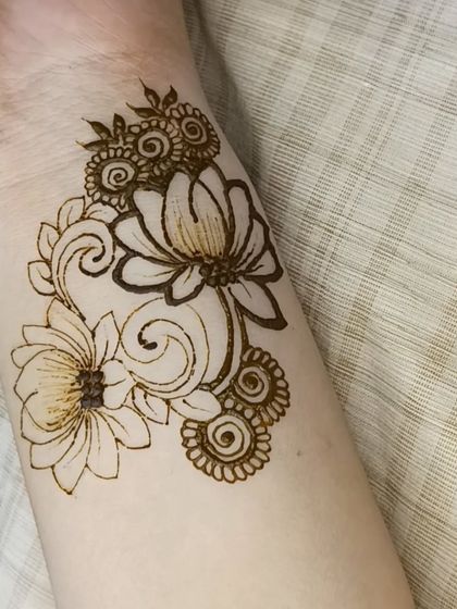 The same lotus patch with more details and shading added. This is a great small design or a component for a larger piece.