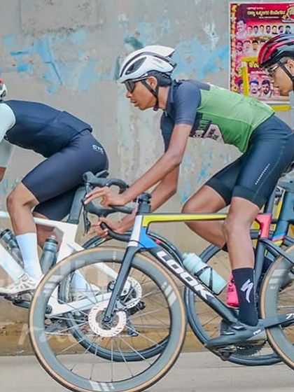 Three riders in a breakaway, trying to establish a lead over the main pack. This is a high-risk, high-reward move that makes road racing so exciting.
