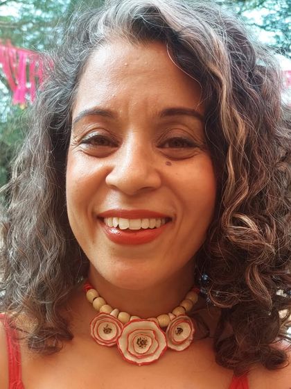 A happy customer wearing one of my flower necklaces at the Goa Potter's Fest. It's wonderful to see my wearable art being enjoyed.