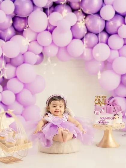From first birthdays to big milestones, I design celebratory setups that are as special as the occasion. This first birthday shoot, complete with a custom cake and a beautiful balloon arch, is all about celebrating your little one in style.